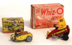 Vintage boxed tin plate "The Whiz-O-Flyer" 10cm long and a boxed clockwork model of clown on