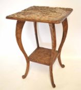 Early 20th century softwood carved two-tier side table profusely carved throughout with three wise
