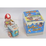 Late 20th century boxed tinplate ice cream seller on tricycle, height approximately 11cm