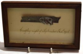 WWI period oak framed fragment containing a riveted metal fragment and marked "Cuffley night of