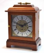 Modern German triple spring driven mantel clock, the case with overhanging cornice and cushion