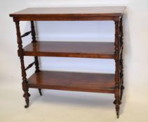 19th century mahogany three-tier dumb waiter with turned and fluted columns with turned supports