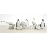 Group of Lladro models including two geese, a swan, some bears and two penguins, (9)