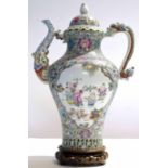 Chinese porcelain kettle or wine jar and cover, decorated in polychrome with two vignettes of