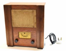 Mid-20th century pine cased radio, I"ssued by BTH Co, EMI, The GEC and Gramophone Co, The Marconi Co