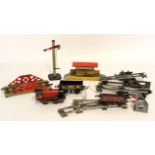 Box containing various Hornby and Mettoy 00 gauge train and accessories including locomotive and