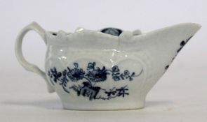 Lowestoft butter boat, circa 1770, decorated with the two porter landscape pattern, with floral