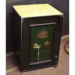Victorian cast iron safe with brass T-bar handle and brass crest of a lion and a unicorn with John