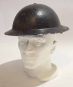 British black painted steel helmet complete with liner and chin strap and painted to the interior "P