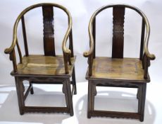 Pair of Chinese hardwood armchairs, each in classical form with horseshoe backs with shaped splat