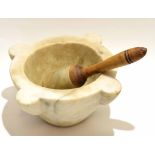 Antique white marble pestle and mortar, the pestle with turned wooden handle