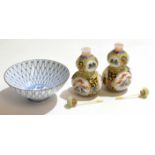 Small Japanese porcelain bowl with a fish in the well, together with two Oriental scent bottles of