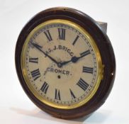 Early 20th century walnut cased dial timepiece, the sectional moulded surround to a spun brass bezel