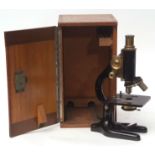 Early 20th century black finished and lacquered brass monocular microscope, C Baker - London, 11244,