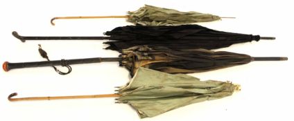 Collection of four Victorian parasols with wooden handles, tallest 90cm