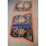 Good quality saddle rug with lotus flower decoration together with further matching smaller rug,