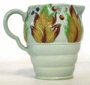 Clarice Cliff Celtic Harvest jug with ribbed body and a floral design above with Clarice Cliff