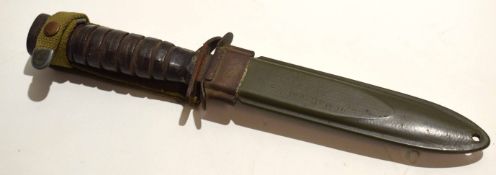 **USA M3 fighting knife with single edged blade with spear point and stamped "US, M3 Case" to a