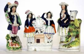 Group of three Staffordshire flat back figures, all decorated in typical fashion, largest 23cm high