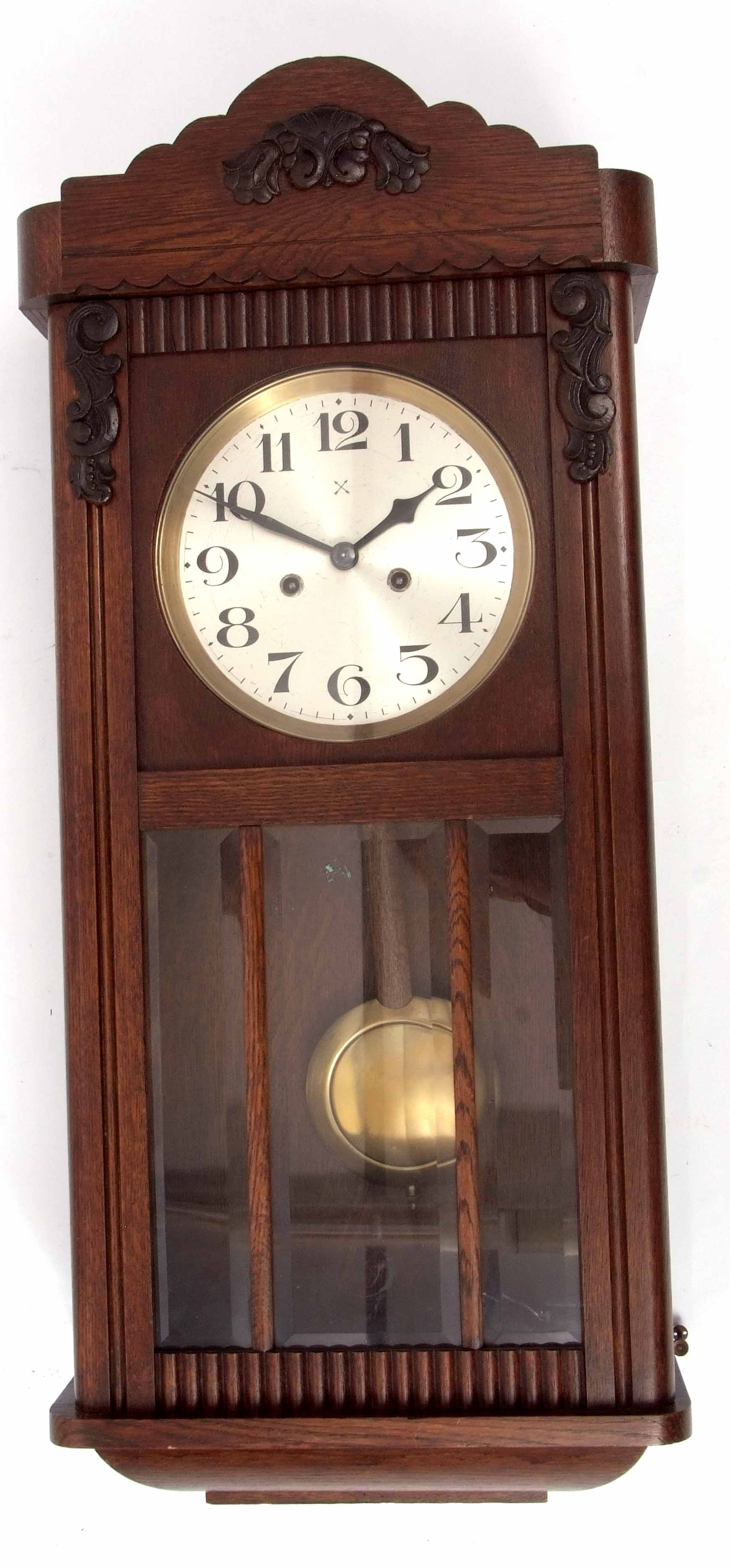 Mid-20th century stained beech wall clock, the shaped pediment to a panelled and glazed door with
