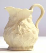 19th century Parian porcelain jug modelled with flowerheads, 7cm high