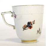 Mid-18th century Meissen chocolate cup with Tau handle, finely decorated with floral sprays