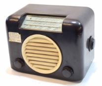 Mid-20th century Bakelite radio, Bush Radio, A C Mains receiver, type AC91 with brown cased glazed