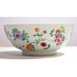 18th century Chinese bowl decorated in famille rose style with flowering plants, 24cm diam