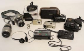 Mixed group including a Nikon f55 35mm camera and lens, together with a Casio digital camera plus