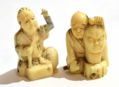Two small carved ivory figures