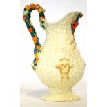 Clarice Cliff Harvest Ware jug, the body with moulded designs of flowers and ears of corn with