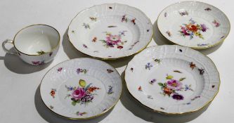 Meissen cup and saucer decorated with floral sprays, together with a further Meissen saucer and