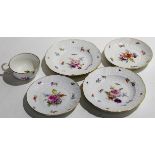 Meissen cup and saucer decorated with floral sprays, together with a further Meissen saucer and