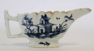 Lowestoft butter boat with twig handle, circa 1765, decorated with a pagoda and trees, 9cm long