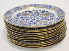 Group of twelve early 19th century Spode side plates with a blue and white design highlighted with