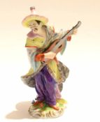 Continental porcelain model of a Malabar musician after Meissen, 19cm high