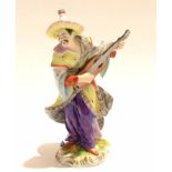 Continental porcelain model of a Malabar musician after Meissen, 19cm high