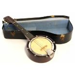Vintage cased banjolin (cross between banjo and mandolin), 52cm long, turning details within