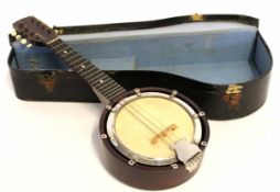 Vintage cased banjolin (cross between banjo and mandolin), 52cm long, turning details within