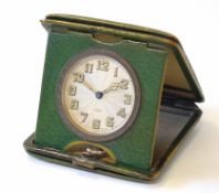 Early 20th century green leather and gilt highlighted folding travel clock, the polished case with