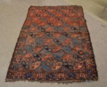 Good quality Bokhara rug decorated predominantly in blue, brown and red with repeating hexagonal