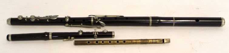 Group: ebonised and nickel mounted vintage flute, 66cm long, vintage rosewood piccolo 31cm long