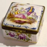 Late 18th century Continental enamelled box and cover with metal mounts, 5cm diam, together with a