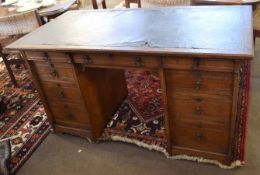 Early 20th century oak framed twin pedestal desk, Gillow & Co stamped to the top of centre drawer,