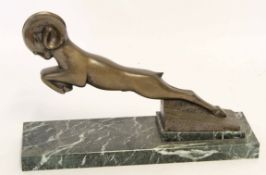 Art Deco bronze of a leaping ram on a green marble base, 40cm wide