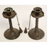 Pair of Hugo Berger Goberg Germany Arts & Crafts candlesticks with chained snuffers, hammered iron