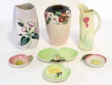 Group of Carlton ware pottery vases with floral designs, together with a Carlton ware pottery ewer