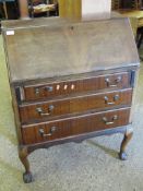 MAHOGANY FRAMED DROP FRONTED BUREAU WITH THREE FULL WIDTH DRAWERS RAISED ON CLAW AND BALL FEET