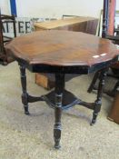 OAK SHAPED TOP EBONISED BASED OCCASIONAL TABLE WITH TURNED LEGS RAISED ON CASTERS