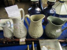 THREE VARIOUS SILICON WARE JUGS WITH PRESSED DETAIL